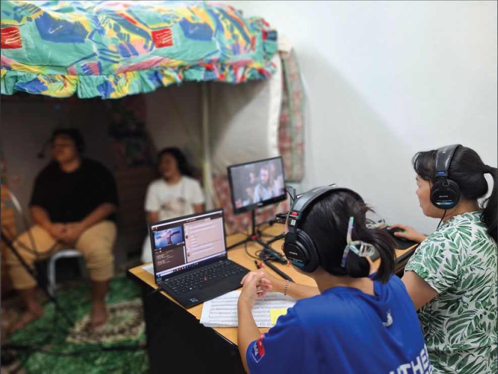 Using mattresses to soundproof the recording ‘studio’ of the Jesus Film.